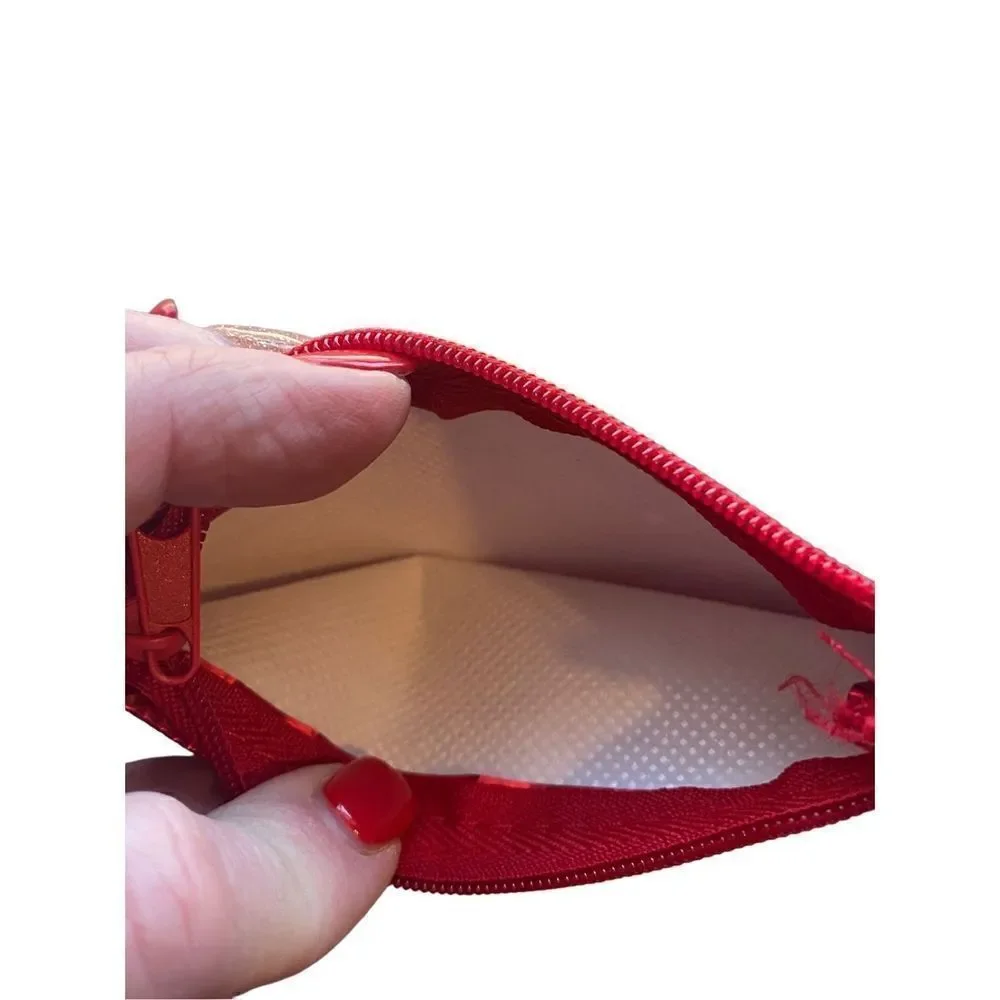 Athleta red zippered travel makeup ear pod gift card bags set of two